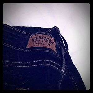 Women's signature Levi modern straight leg jeans.